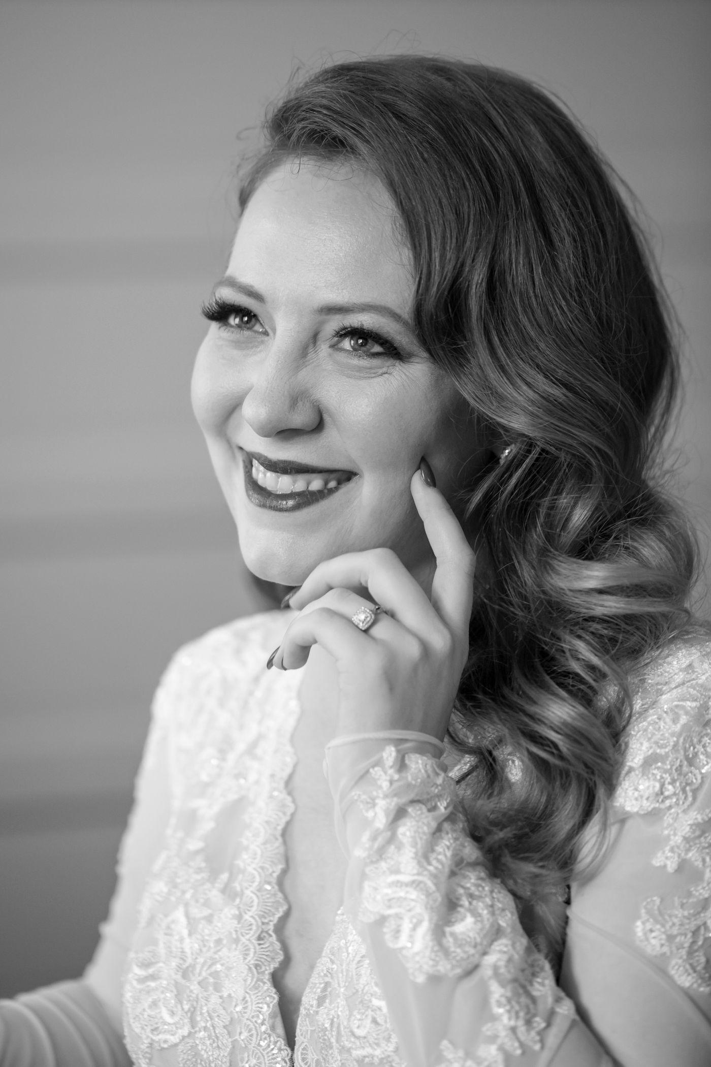 Smiling bride in her wedding dress